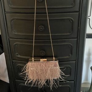 Olga Berg Feathered Blush Clutch with Gold Chain Blush is the true color